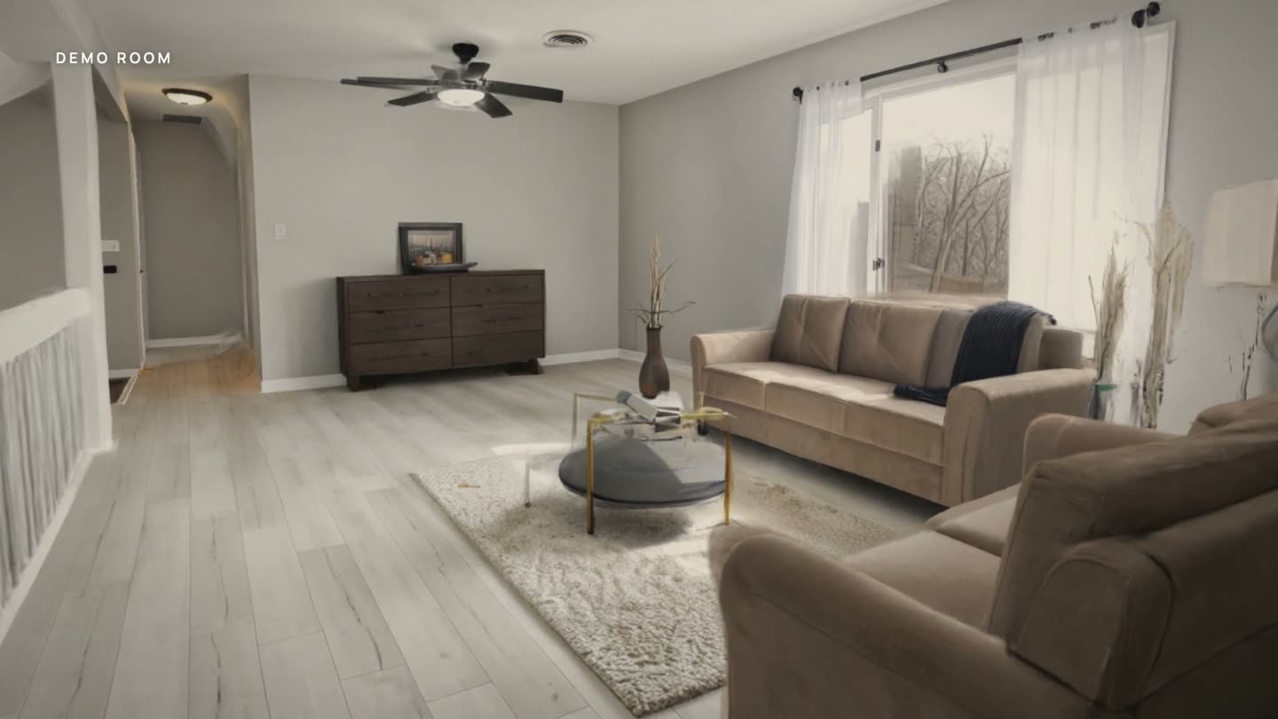 A living room rebuilt as a 3D world, seen from the couch