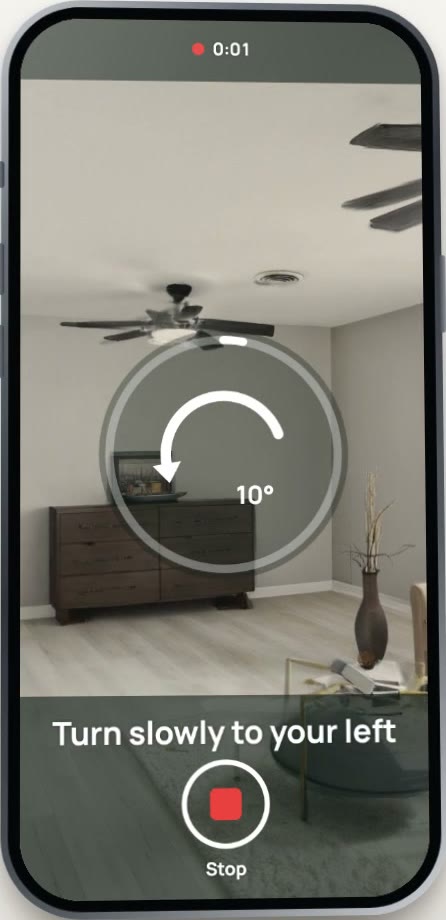 The app filming a living room, asking to turn slowly to the left
